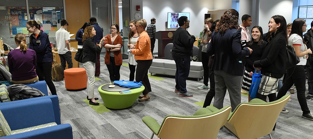 A group of people attending a language center event