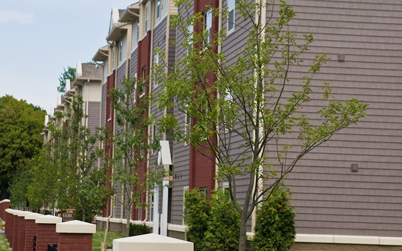 Photo of the outside of Riverview Apartments across the Genesee River from River Campus