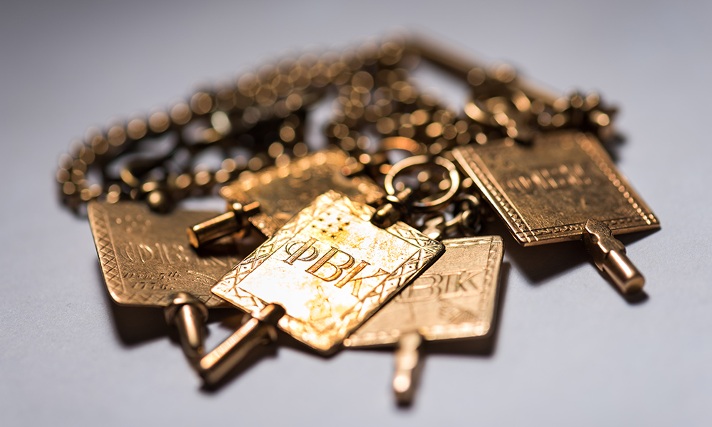 Five phi beta kappa keys on chains.