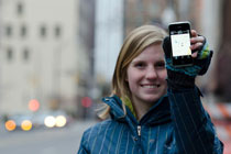 Girl holding cell phone.