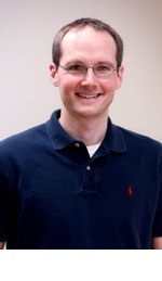 Headshot of John Duggan.