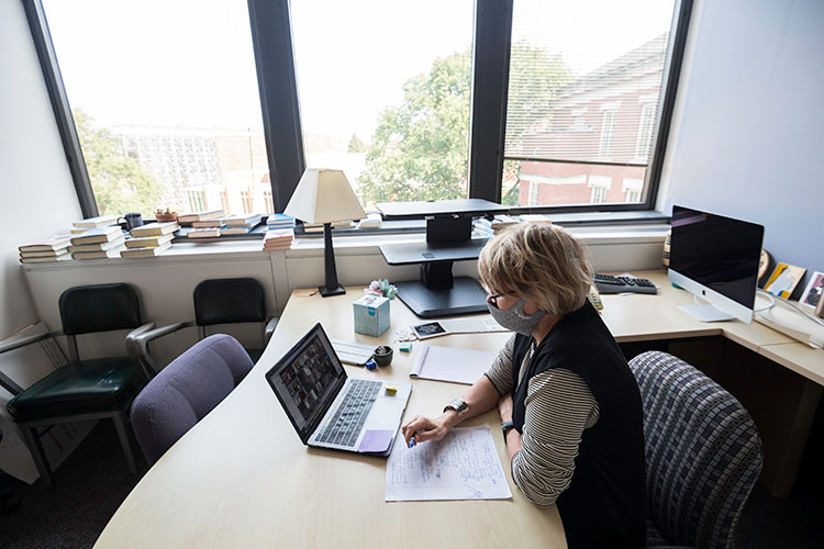 A professor using Zoom to teach a class.