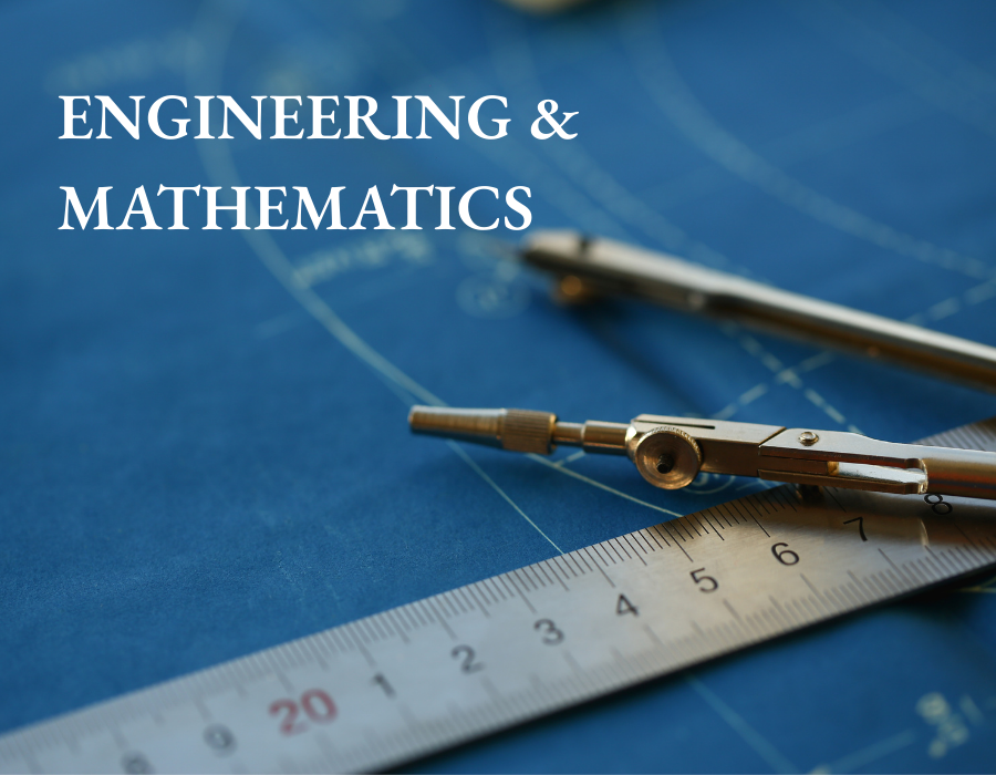 A compass and ruler on a blueprint.