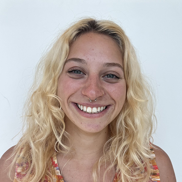 Headshot of Julia Largett.