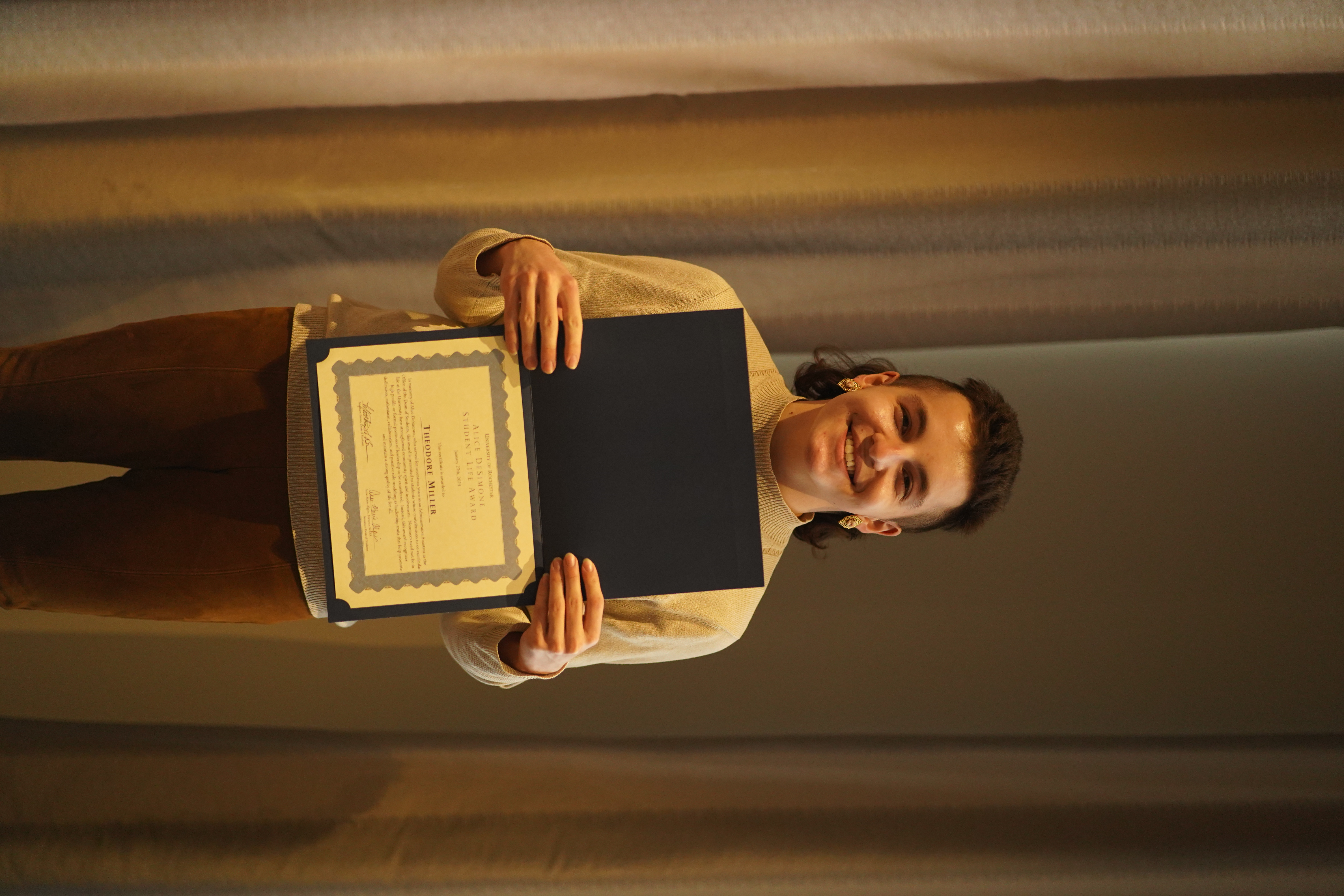 Theodore Miller accepting award