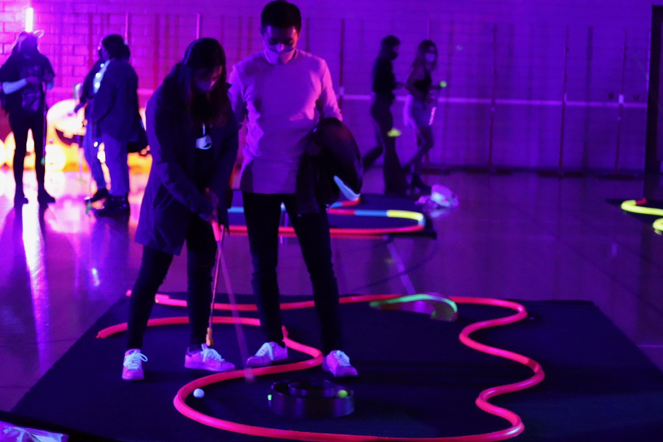 Students at glow golf