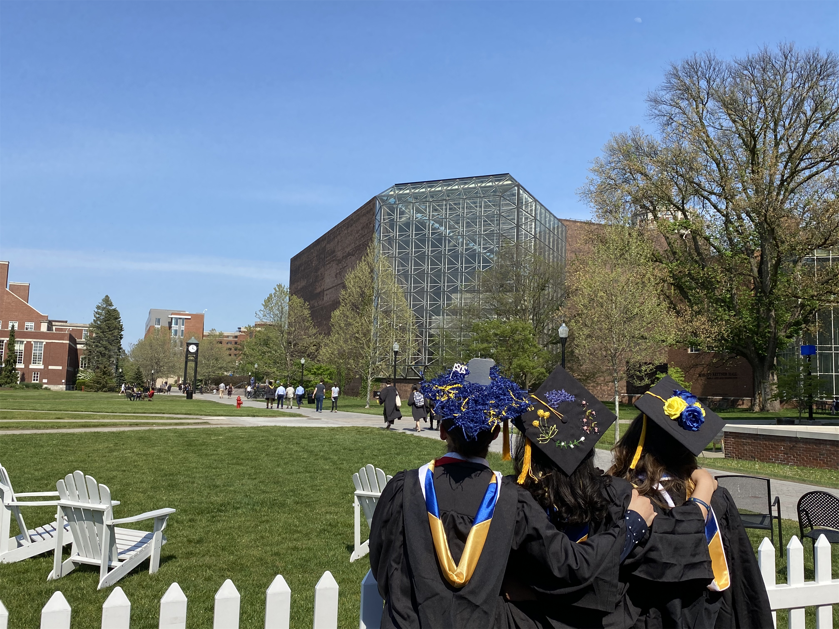 A group of graduating students hugging