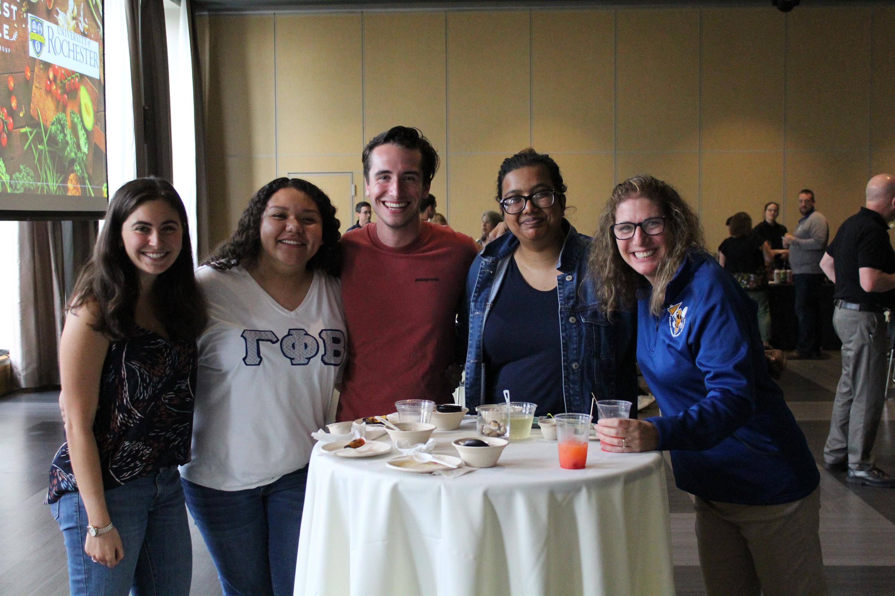 Group photo of students with Anne-Marie Algier