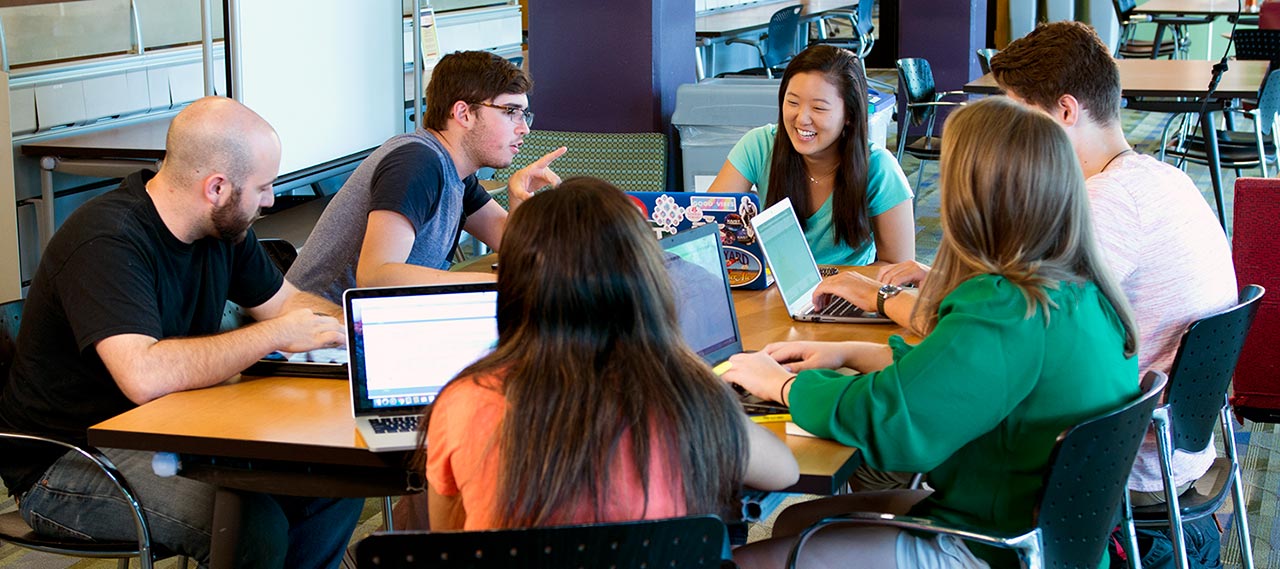 Students meeting in a group.