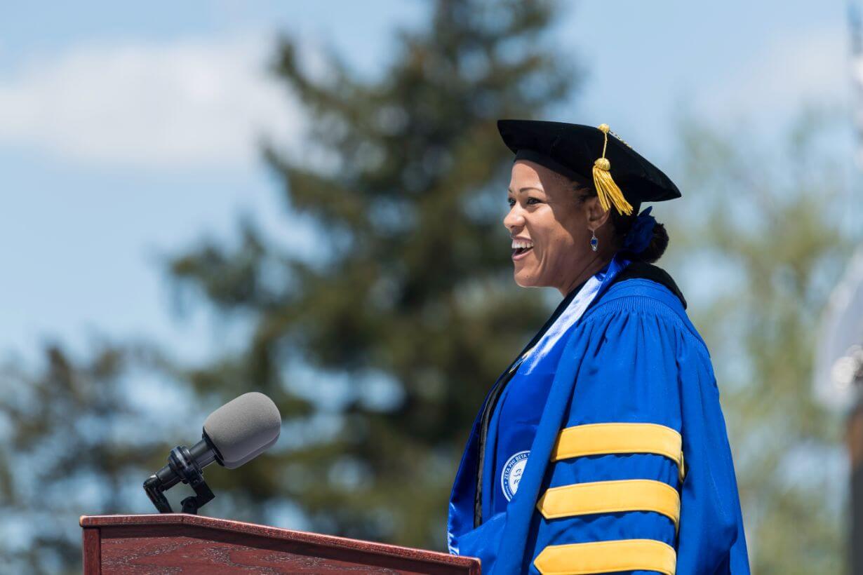 Class of 2022 students celebrating graduation on Rochester's campus.