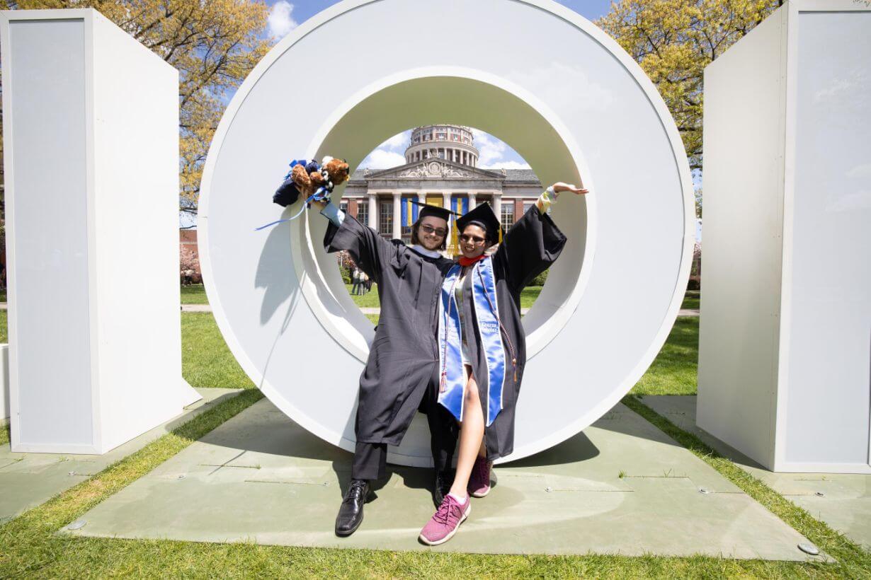 Class of 2022 students celebrating graduation on Rochester's campus.
