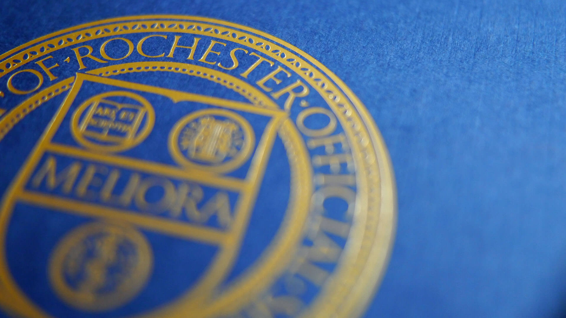 Close up the University of Rochester Commencement book cover