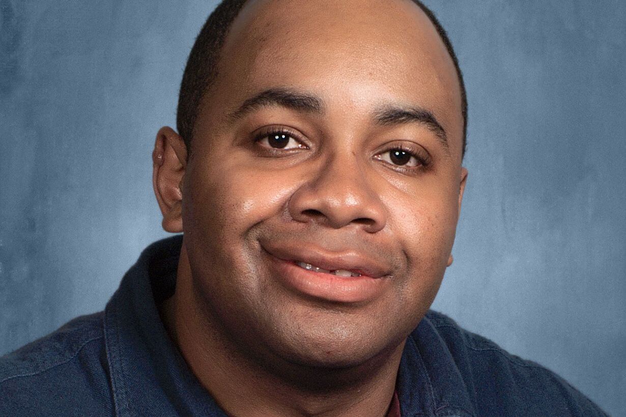 Portrait of Derek Ward-Joyles.