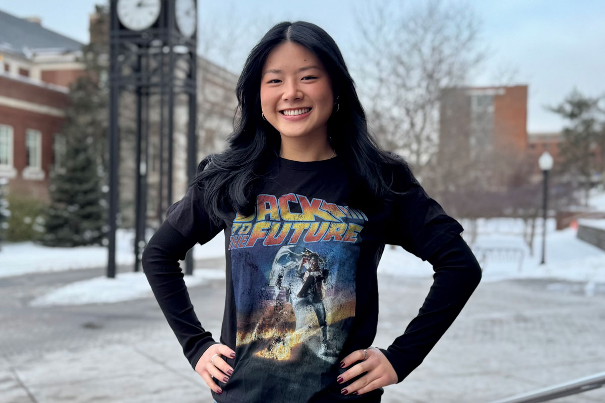 A University of Rochester Class of 2025 student, Rebecca Frank, wearing a Back to the Future t-shirt.