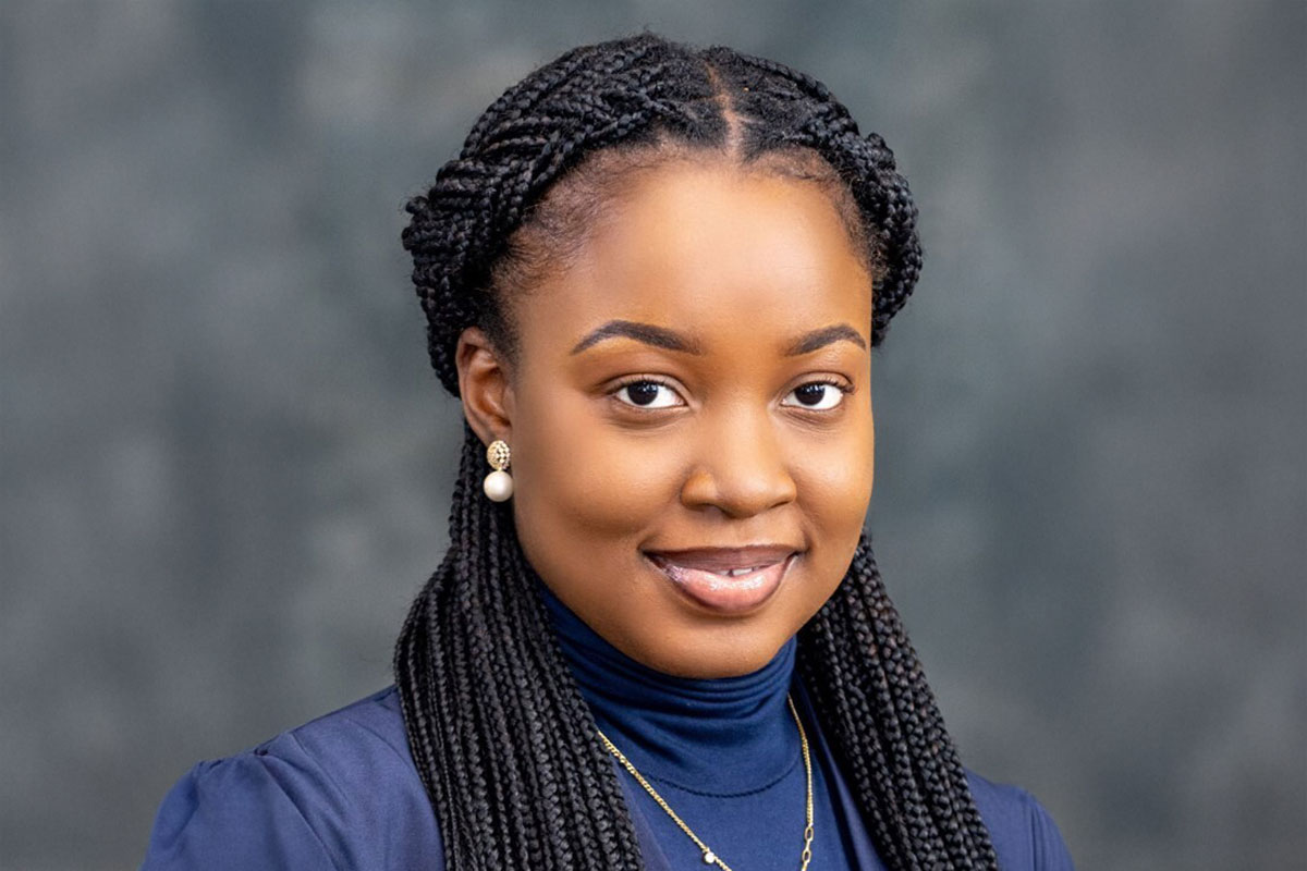 A woman with braids wearing a blue shirt, identified as Temitope Ishmael, University of Rochester Class of 2025.