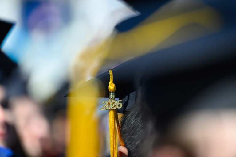 Close-up of a University of Rochester graduation cap with a gold 2026 tassel during Commencement Weekend.