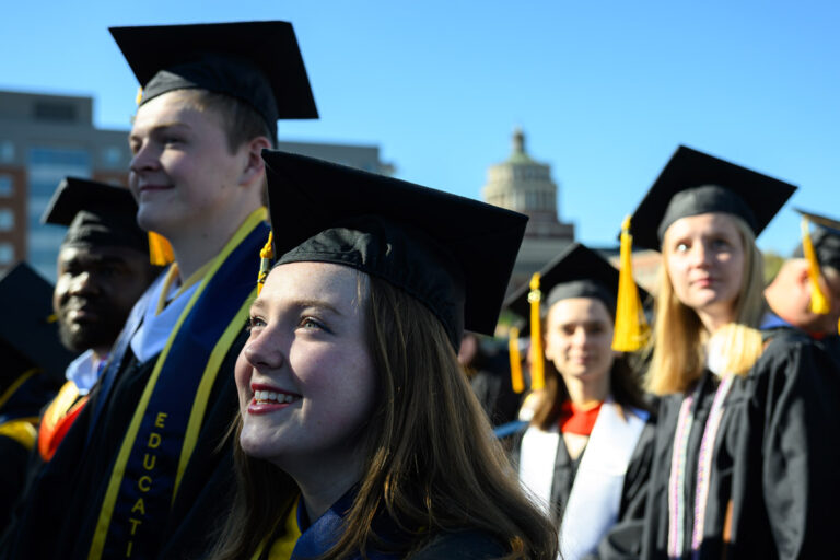 University of Rochester graduates look toward the stage during Commencement Weekend.