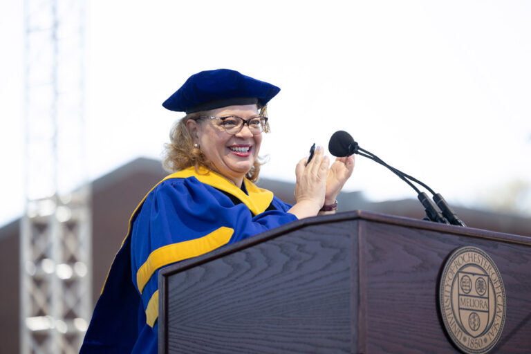 University of Rochester speaker delivers remarks from the Commencement Weekend podium.