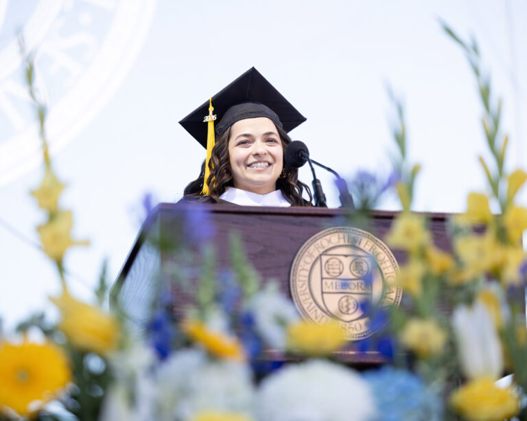 Gulsinam Akhmadzhanova ’26 delivers remarks to the undergraduate graduate class