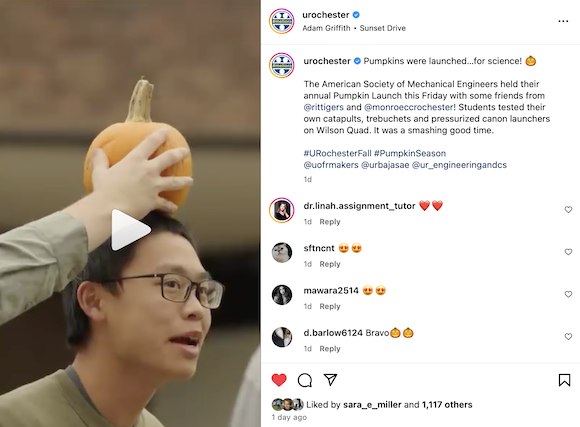 Screenshot of the University's Instagram showing a student with a pumpkin placed on their head during the annual pumpkin launch