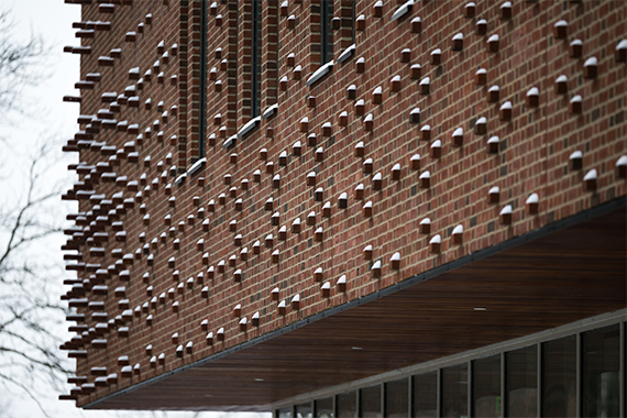 Snow-covered side of Wegmans Hall.