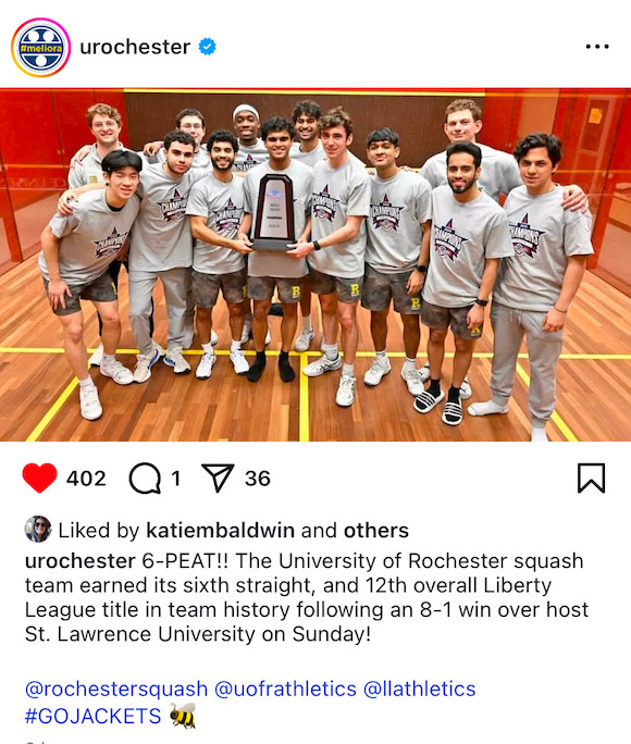 Team photo with trophy of Rochester's squash team.