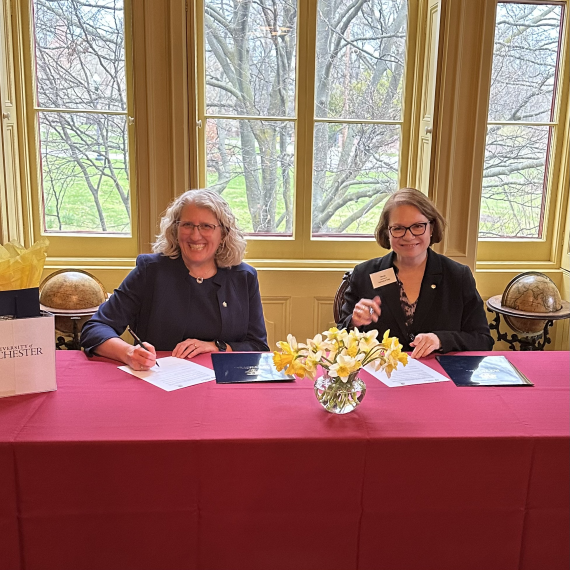 Provost Nicole S. Sampson and Rector Marjo Kaartinen from the University of Turku smile during a MOU signing ,