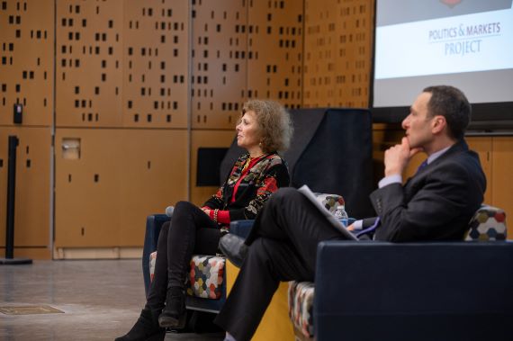 Former ACLU President Nadine Strossen and Professor David Primo sit on the stage in Wegmans Hall.