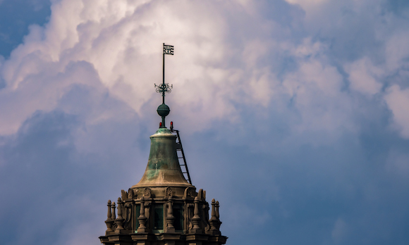 Storm clouds roll past University of Rochester’s Rush Rhees Library.