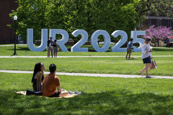 Large letters spelling UR2025 are installed on the campus quad. 