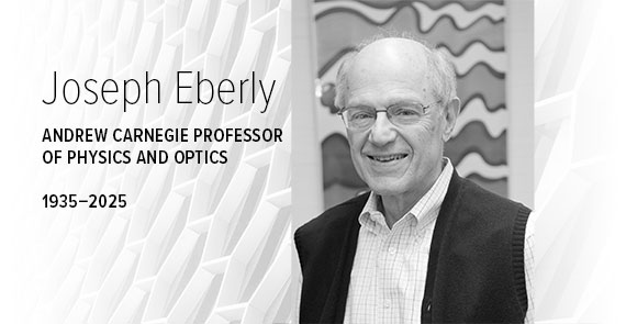 A black and white graphic with hexagonal shapes in the background, a headshot of Joseph Eberly, and text that says, "Joseph Eberly, Andrew Carnegie Professor of Physics and Optics, 1935-2025."