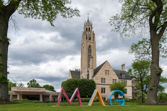 Outside of the Memorial Art Gallery. Large letters spelling out MAG are on the front lawn. 