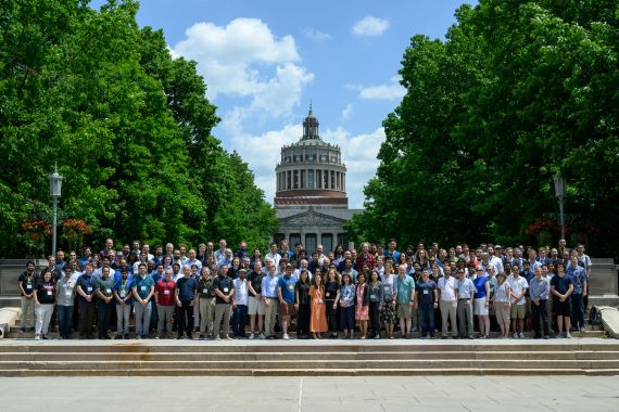 Group photos of attendees at the Rochester Conference on Coherence and Quantum Science. 