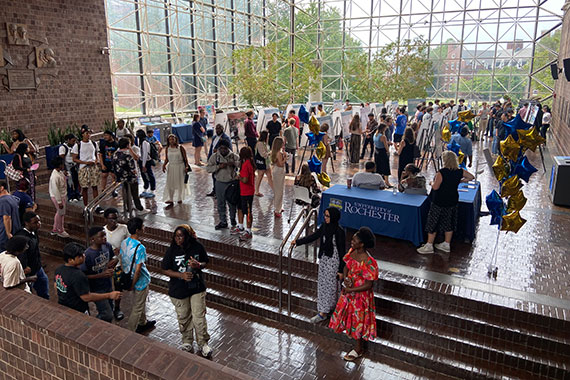 Dozens of students present during a poster session held in the atrium of Wilson Commons.