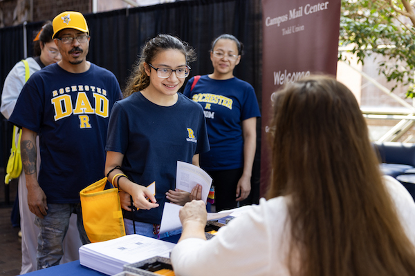 First year student Amberlee Estrada is joined by her parents as she checks in at Wilson Commons.