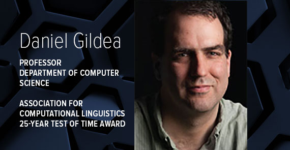 A graphic with dark blue hexagonal shapes, a headshot of Daniel Gildea, and text that says "Daniel Gildea, Professor, Department of Computer Science, Association for Computational Linguistics 25-year Test of Time Award."