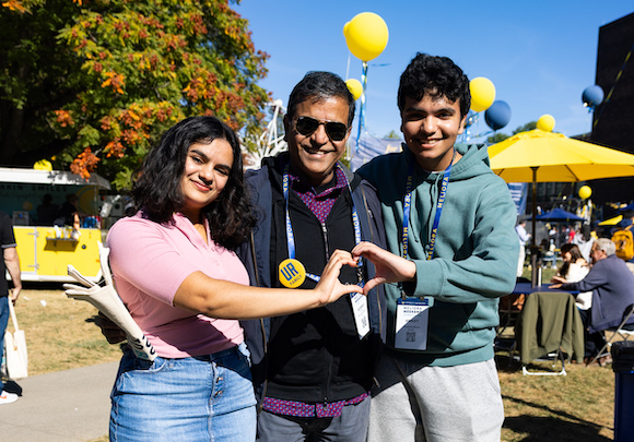 A family celebrates Meliora Weekend. 
