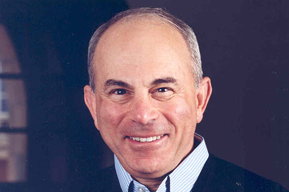 A closeup of a smiling Ed Hajim.