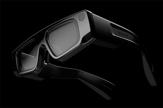 A pair of Snapchat Spectacles against a black background.