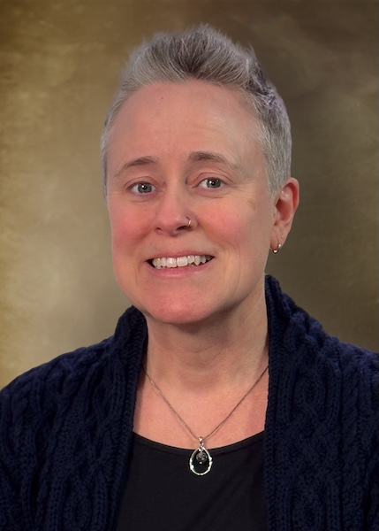 Headshot of smiling employee. 