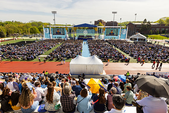 A view of the University of Rochester Commencement stage from the Fauver Statdium bleachers.