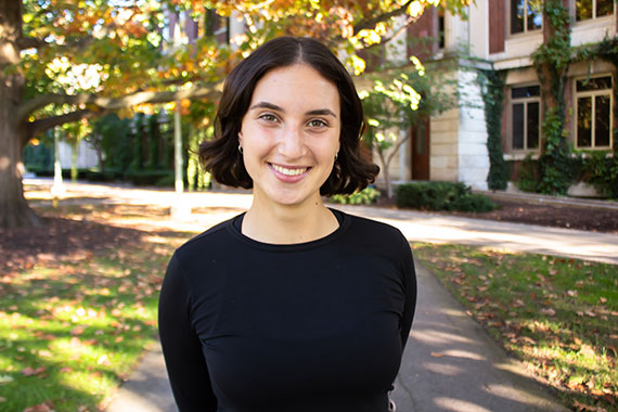 A medium shot of Marlena Berger on URochester's Eastman Quadrangle.