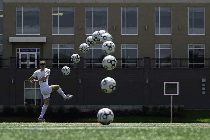 A composite photo of a men's soccer player curving a kick. 