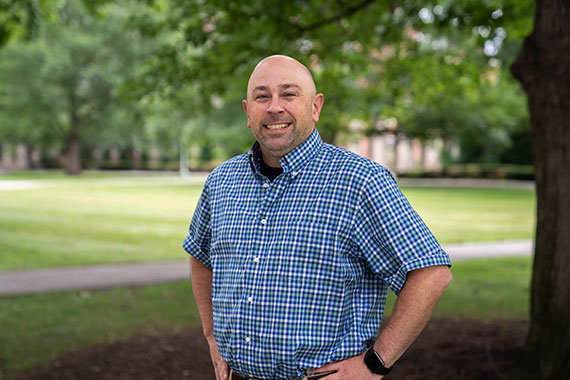 A medium shot of Nick Valentino on the Eastman Quadrangle.