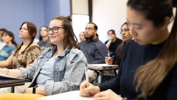 Students take notes during class.