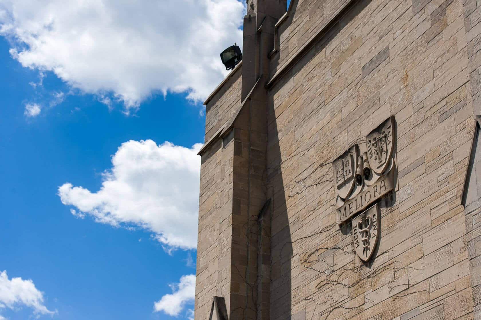 Meliora crest on the side of Cutler Union at the University of Rochester's Memorial Art Gallery May 16, 2013. // photo by J. Adam Fenster / University of Rochester