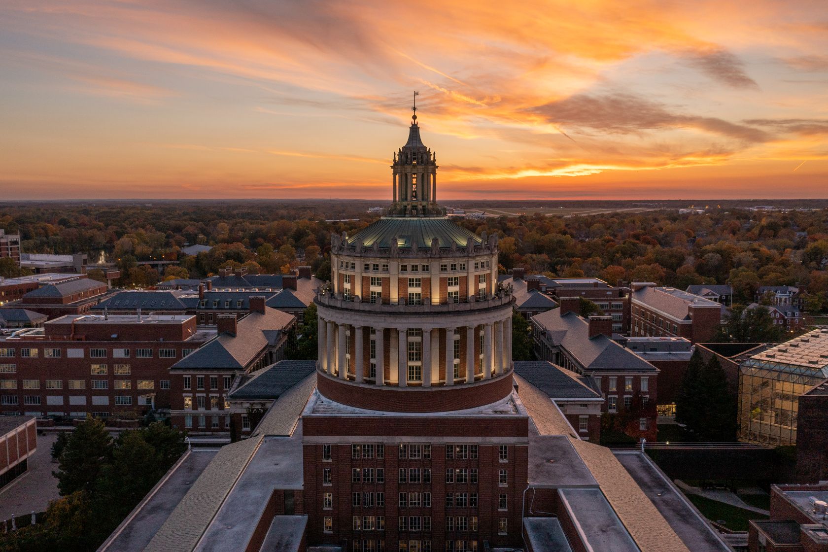 Aerial drone photo of Rush Rhees Library Tower, as seen during sunset October 24, 2023 // photo by AJ Pow / University of Rochester