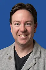 Headshot of Logan Green.