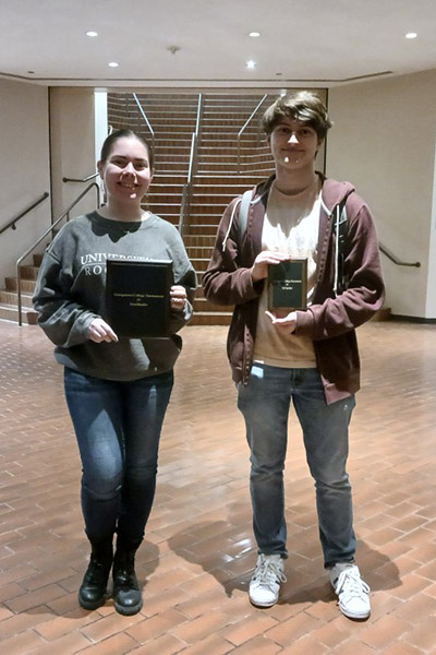 Isabel Edelstein poses with her semi-finalist trophy with UT-SA partner Sebastian.