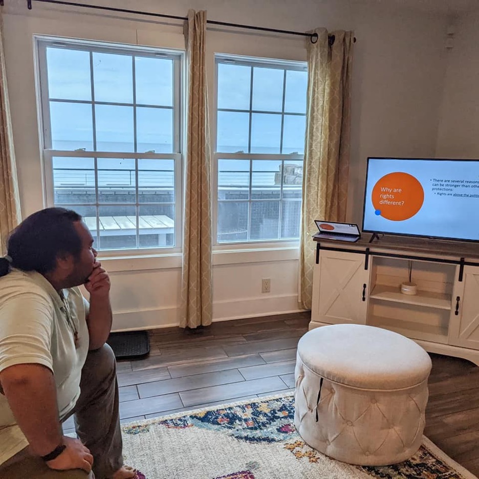 A person wating a tv.